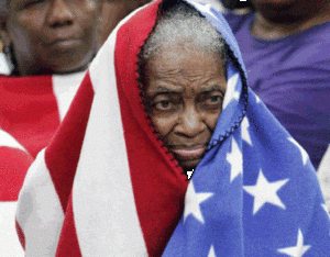 Hurricane Katrina Survivor with American Flag